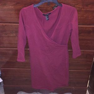 Red long sleeve v neck dress.